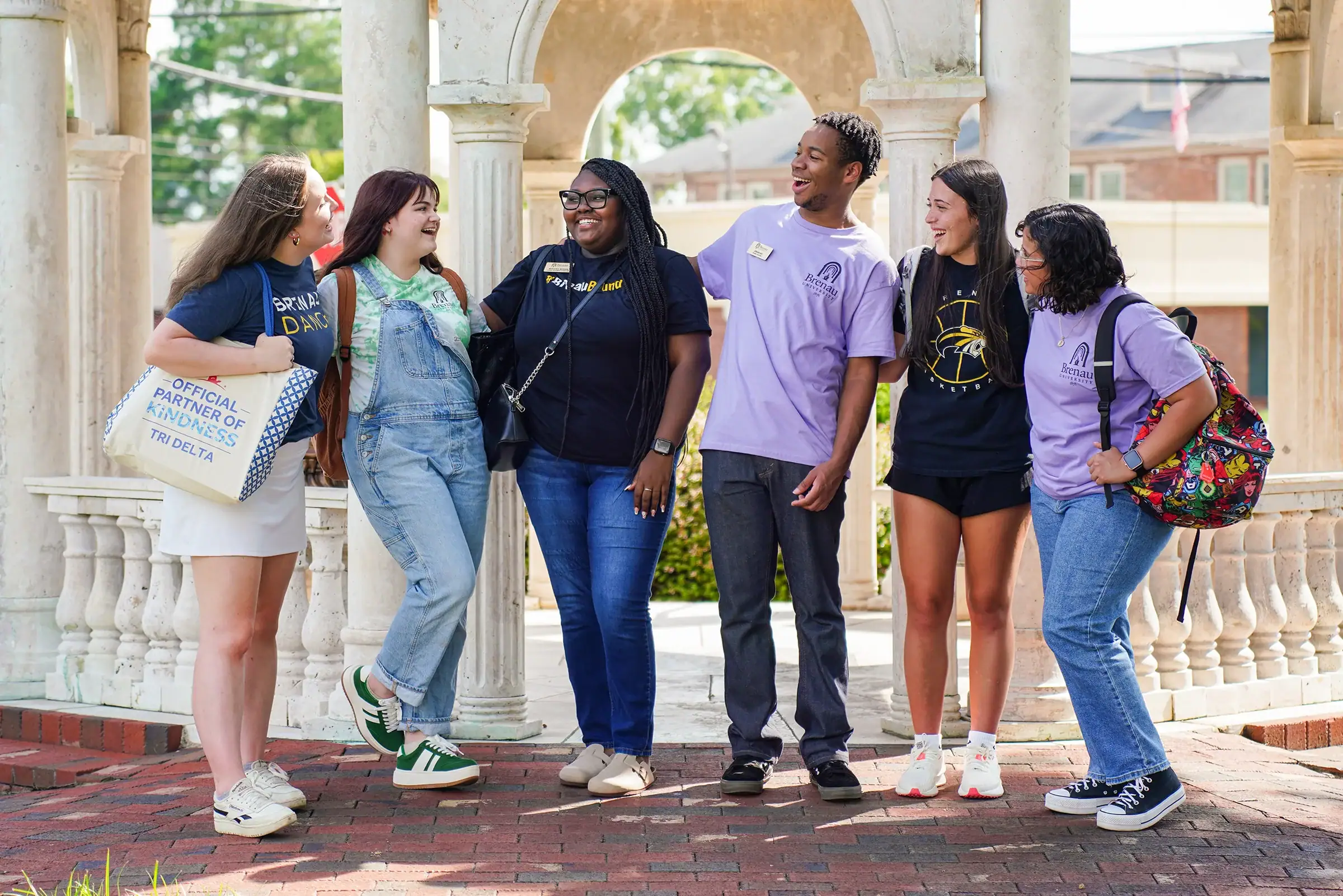 Student leaders smiling on campus