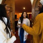 Students laugh before the Brenau University Martin Luther King Jr. Convocation.