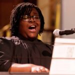 Portia Burns sings at the Brenau University Martin Luther King Jr. Convocation.