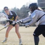 Bonnie Lauman shoots while goalkeeper Haley Heil during a lacrosse practice at Riverside Military Academy on Friday, Jan. 26, 2018 in Gainesville, Ga. (AJ Reynolds/Brenau University)