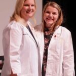 two nursing students posing for a photo