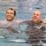 Brenau head coach Nathan Rhoads jumps in the pool after winning during the Appalachian Athletic Conference Swimming & Diving Championship Meet on Saturday, Feb. 9, 2019 in Kingsport, Tenn. Brenau won the meet and are Appalachian Athletic Conference Champions for the second straight year. (AJ Reynolds/Brenau University)