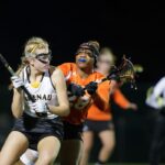 Brenau's Cora Wallace, a freshman from Cumming, Ga., looks for a pass during the first Brenau lacrosse match against Georgetown College on Friday, Feb. 9, 2018 in Gainesville, Ga. (AJ Reynolds/Brenau University)