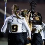Brenau players celebrate after scoring a goal during the first Brenau lacrosse match against Georgetown College on Friday, Feb. 9, 2018 in Gainesville, Ga. (AJ Reynolds/Brenau University)