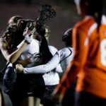Brenau players celebrate after scoring a goal during the first Brenau lacrosse match against Georgetown College on Friday, Feb. 9, 2018 in Gainesville, Ga. (AJ Reynolds/Brenau University)