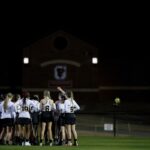 Brenau players huddle up for a timeout during the first Brenau lacrosse match against Georgetown College on Friday, Feb. 9, 2018 in Gainesville, Ga. (AJ Reynolds/Brenau University)