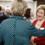 Sandra Greniwicki speaks with Susan Stone during Masters in the Art of Nursing: Healers among us on Thursday, Feb. 15, 2018 at Whalen Auditorium in Brenau East in Featherbone Communiversity in Gainesville. (AJ Reynolds/Brenau University)