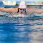 Athlete swimming butterfly