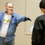 zombie reaches out at student