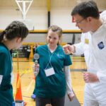 student look at medical instrument