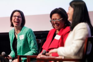 Kim Powell, Michele Ozumba and Qing Cao laugh during the Q&A portion of Women's Leadership Colloquium on Friday, March 15. (AJ Reynolds/Brenau University)