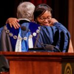 Cierra Franklin gets a hug from Brenau President Ed Schrader as she receives the Algernon Sydney Sullivan Scholarship during the Brenau University Honors Convocation on Thursday, April 12, 2018. (AJ Reynolds/Brenau University)