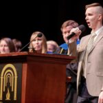 Bobby Reidling sings the alma mater during the Brenau University Honors Convocation on Thursday, April 12, 2018. (AJ Reynolds/Brenau University)