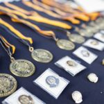 Awards on display for each 5 year reunion, including medals for all 50 year alumnae. (AJ Reynolds/Brenau University)