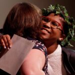 Amari Banks gets a hug from Allison Carling as she is recognized as one of the lead resident assistants at Class Day. (AJ Reynolds/Brenau University)
