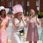 Susan Papesh sing sons with other members of the Phi Mu sorority during the sorority open house of the Alumnae Reunion Weekend & May Day at Brenau University Saturday, April 14, 2018, in Gainesville, Ga. Photo by Jason Getz / Brenau University