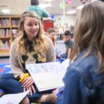 Students read to each other.