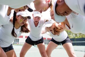 Brenau tennis players chant before the semifinal round of the Appalachian Athletic Conference women's tennis championships on Saturday, April 21, 2018, in Chattanooga Tenn. Brenau defeated Reinhardt 5-0. 