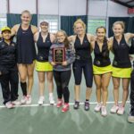 Brenau players and coaches, from left to right, Brenau assistant coach John Davis, Peeraya Charoensirisutthikul, a freshman from Marietta, Ga., Rebecca Pijls, a junior form Beek, The Netherlands, Kirsten Dickins, a junior from London, England, Valentina Pabon, a freshman from Bogota, Columbia, Paula Rives Palau, a senior from Barcelona, Spain, Maya Mammetgulyyeva, a senior from Ashgabat, Turkmenistan, Patricia Recalde Pacua, a senior from Asuncion, Paraguay, and Brenau head coach Andre Ferreira after winning the final round of the Appalachian Athletic Conference women's tennis championships on Sunday, April 22, 2018, in Chattanooga Tenn. Brenau defeated SCAD Atlanta 5-0 to win the AAC Championship. (AJ Reynolds/Brenau University)