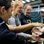 Brenau players huddle together after winning all three doubles points during the final round of the Appalachian Athletic Conference women's tennis championships on Sunday, April 22, 2018, in Chattanooga Tenn. Brenau defeated SCAD Atlanta 5-0 to win the AAC Championship. (AJ Reynolds/Brenau University)