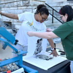 The arts showcase featured a silk screening station making t-shirts