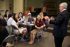 President Ed Schrader speaks to the ANU-Brenau University students during a luncheon at Brenau University Friday May 4, 2018 in Gainesville, Ga.