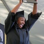 Jametria Belo reacts after she received her diploma during the Women's College Commencement at Brenau University Friday May 4, 2018 in Gainesville, Ga. (Jason Getz for Brenau University)