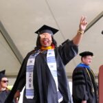 Daja Jones reacts after she receives her degree during the graduate and undergraduate commencement Saturday May 5, 2018 in Gainesville, Ga. (Jason Getz for Brenau University)