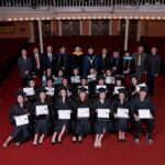 May 5, 2018 - Gainesville, Ga: ANU-Brenau University students pose with ANU and Brenau representatives during the graduate and undergraduate commencement Saturday May 5, 2018 in Gainesville, Ga. (Jason Getz for Brenau University)