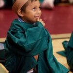 Juan Gonsalez listens to instructions during the graduation ceremony for the RISE summer program. (AJ Reynolds/Brenau University)