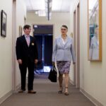 Dr. Skelder walking with a staff member