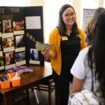 staff talking with students