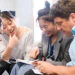 Chinese student smiles as she choses a name