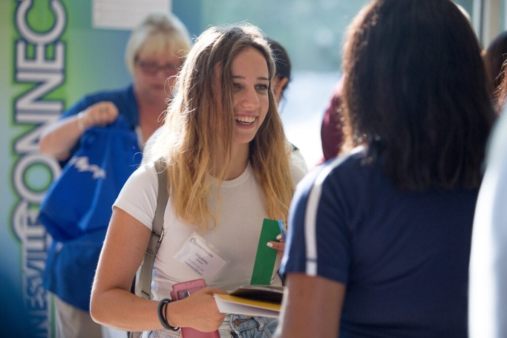 Nikoletta Alvanour, a freshman student from Greece and member of the swim team, check in. (AJ Reynolds/Brenau University)