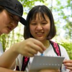 Students testing water at Chicopee Lake.