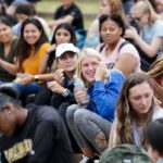 Students sitting at the ceremony.