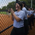 Teammates cheering on players