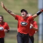 UGA player with hands up