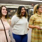 Art students surprise Professor Claudia Wilburn with flowers following her lecture