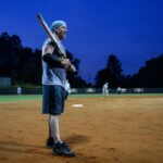 student holding a bat