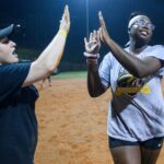 coach high fives student