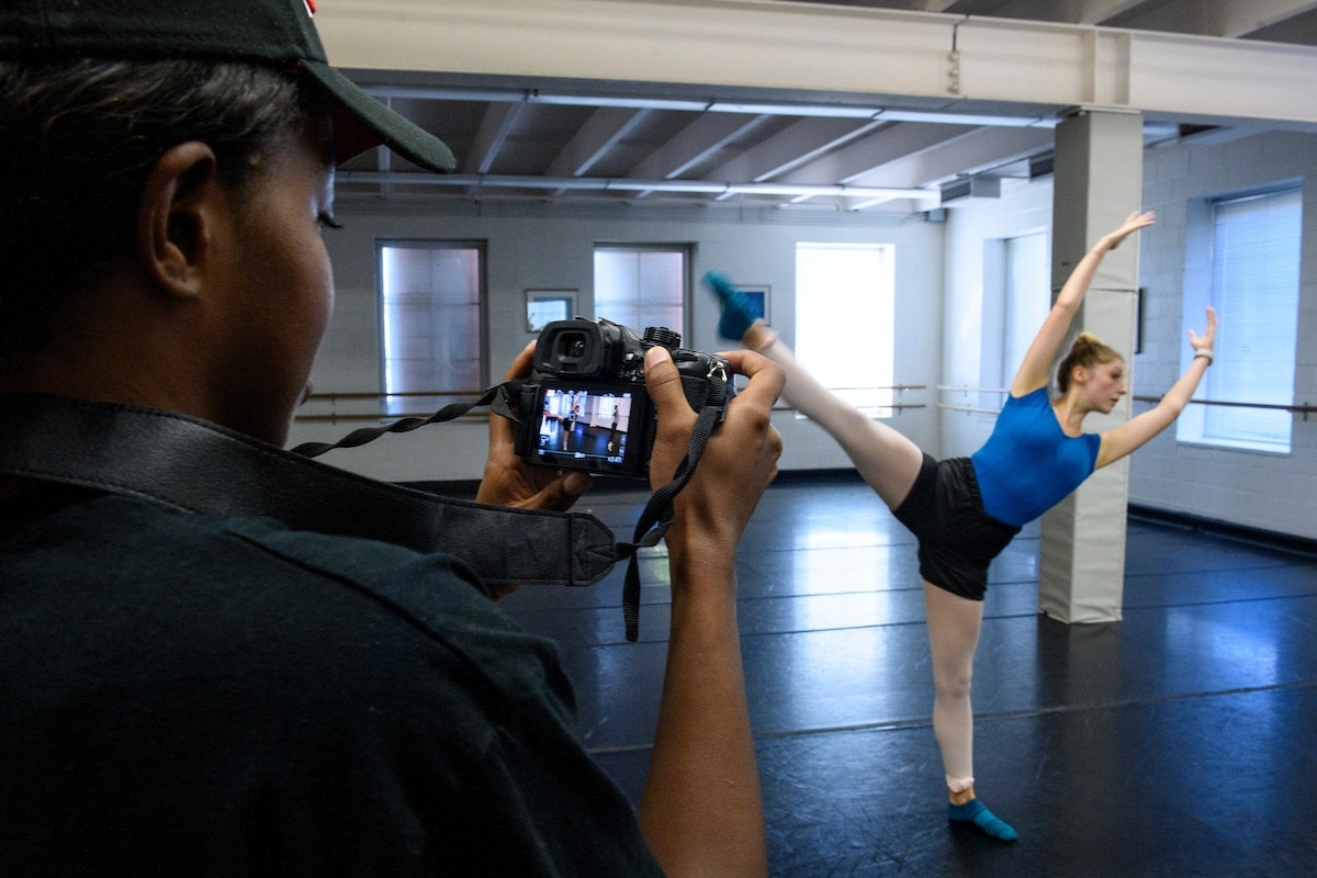 Student films a ballet dancer