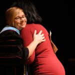 Darlene Drew and Amanda Lammers hug