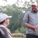 Brenau head coach Damon Stancil talks with Brenau's Amber Clayton, a senior from Lawrenceville, Ga. and Brenau's Annika Blanton, a sophomore from Hoschton, Ga. during the Berry Invitational on Tuesday, Oct. 24, 2018 in Rome, Ga. (AJ Reynolds/Brenau University)