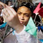 girl hanging butterfly