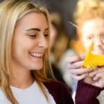 female student holder her butterfly