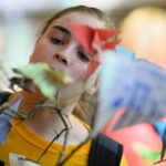 student looking at paper
