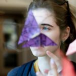 butterfly covering students face