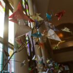 Tree filled with paper butterflies