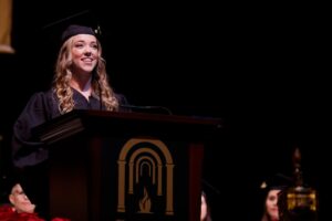 Lauren Hill, class of 2019, addresses the audience during the winter 2019 commencement ceremonies.